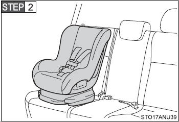 Place the child restraint system on the seat facing the front of the vehicle.