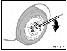 9. Lower the vehicle completely and tighten the wheel nuts.