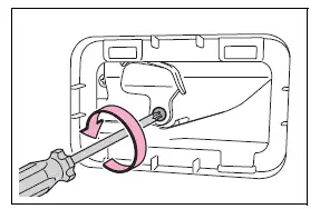 Loosening the Toyota RAV4 back door emergency release cover screw