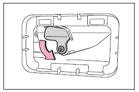 Turning the internal cover to access the back door release mechanism