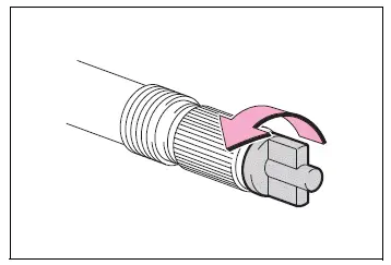 Air release cap removed from the extended compressor hose