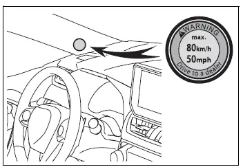 Temporary tire repair warning sticker placed within the driver's view