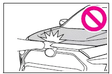 Warning to keep hands clear while closing the hood