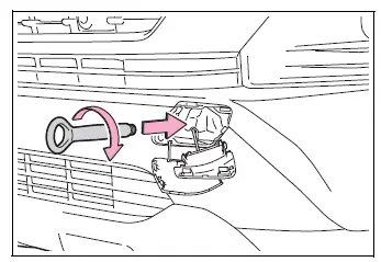 Type B towing eyelet being tightened by hand