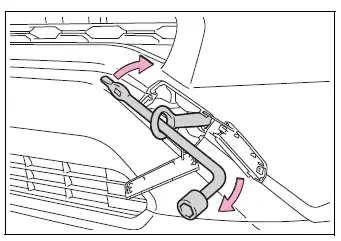 Tightening the Type A towing eyelet with a wheel nut wrench