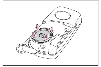 Battery cover installed with its retaining tab facing upward