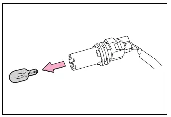 Front side marker light bulb removed from its socket
