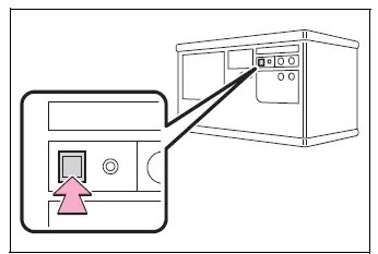 Garage door opener Learn button being pressed for rolling-code programming