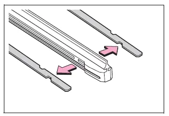 Metal support plates removed from a windshield wiper insert