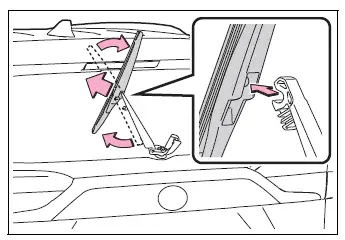 Rear wiper blade being detached from the wiper arm