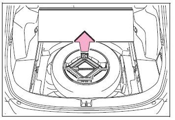 Jack being removed from its storage compartment beneath the deck board
