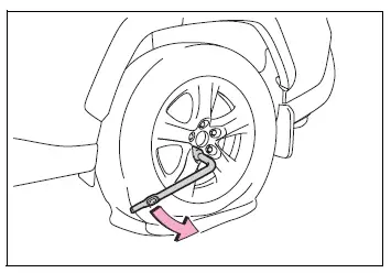Wheel nuts loosened approximately one turn before jacking up the vehicle