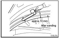 (A) After the adhesive has been removed from the body, remove the paint from