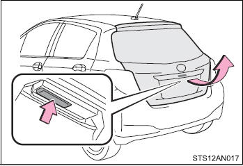 Raise the back door while pushing up the back door opener switch.