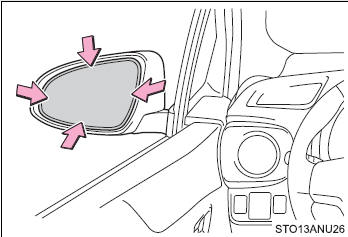 Adjust the mirror up, down, in or out by pushing the mirror surface.