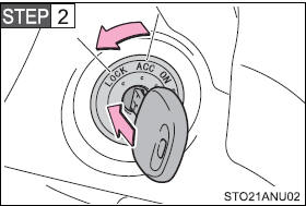 Push in the key and turn it to the “LOCK” position.