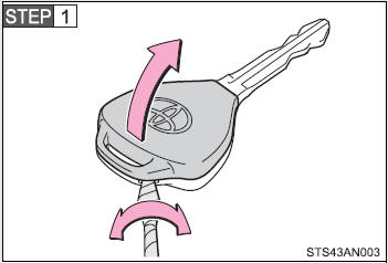 Remove the cover. To prevent damage to the key, cover the tip of the screwdriver