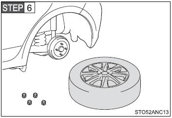 When resting the tire on the ground, place the tire so that the wheel design