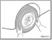 7. Remove the wheel nuts and change tires.