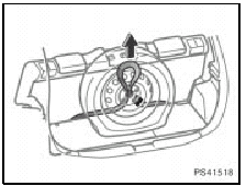 5. Pass the belt through the center hole of the flat tire wheel.