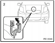 2. In front of the vehicle, pull up the auxiliary catch lever and lift the