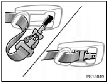 2. Insert the tabs of the center seat belt into the cover. Make sure the tabs