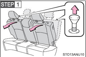 Pull the lock release knob and fold down the seatback until it reaches the position