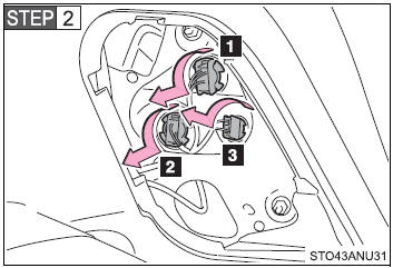 Turn the bulb base counterclockwise.