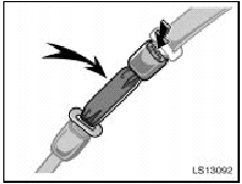 To connect the extender to the seat belt, insert the tab into the seat belt