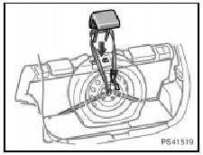6. Put the center portion of the belt onto the rear center head restraint position